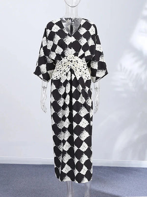 HIA diamond print twist-front dress — mannequin front view