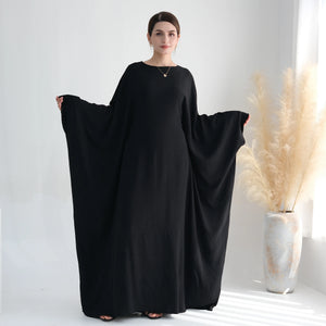 Black batwing abaya front view with extended sleeves