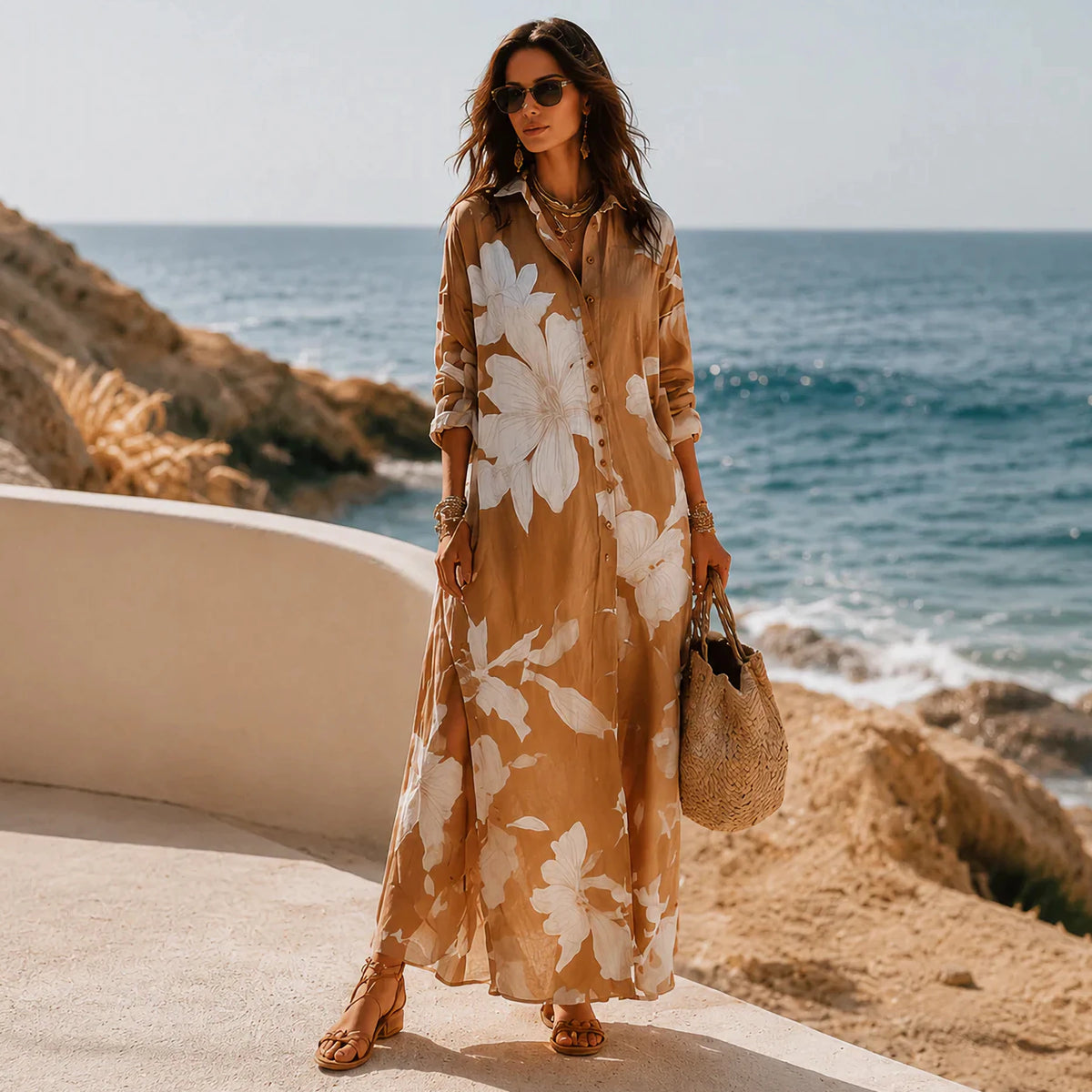 Brown botanical print shirt dress styled by the sea