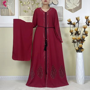 Burgundy Leaf abaya with decorative hem motifs