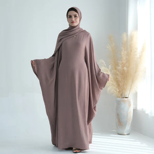 Mauve taupe abaya styled with a scarf