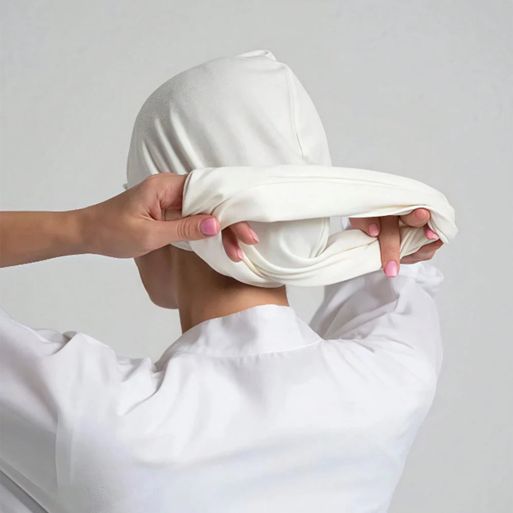 HIA Stretch Tie-Back Undercap — adjustable tie-back detail