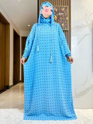 Light blue fine-dot hooded prayer dress, full-length front view