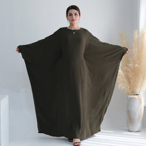 Army green batwing abaya showing the full sleeve silhouette