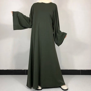 Army green Classic Nida Belted Abaya shown loose with wide sleeves