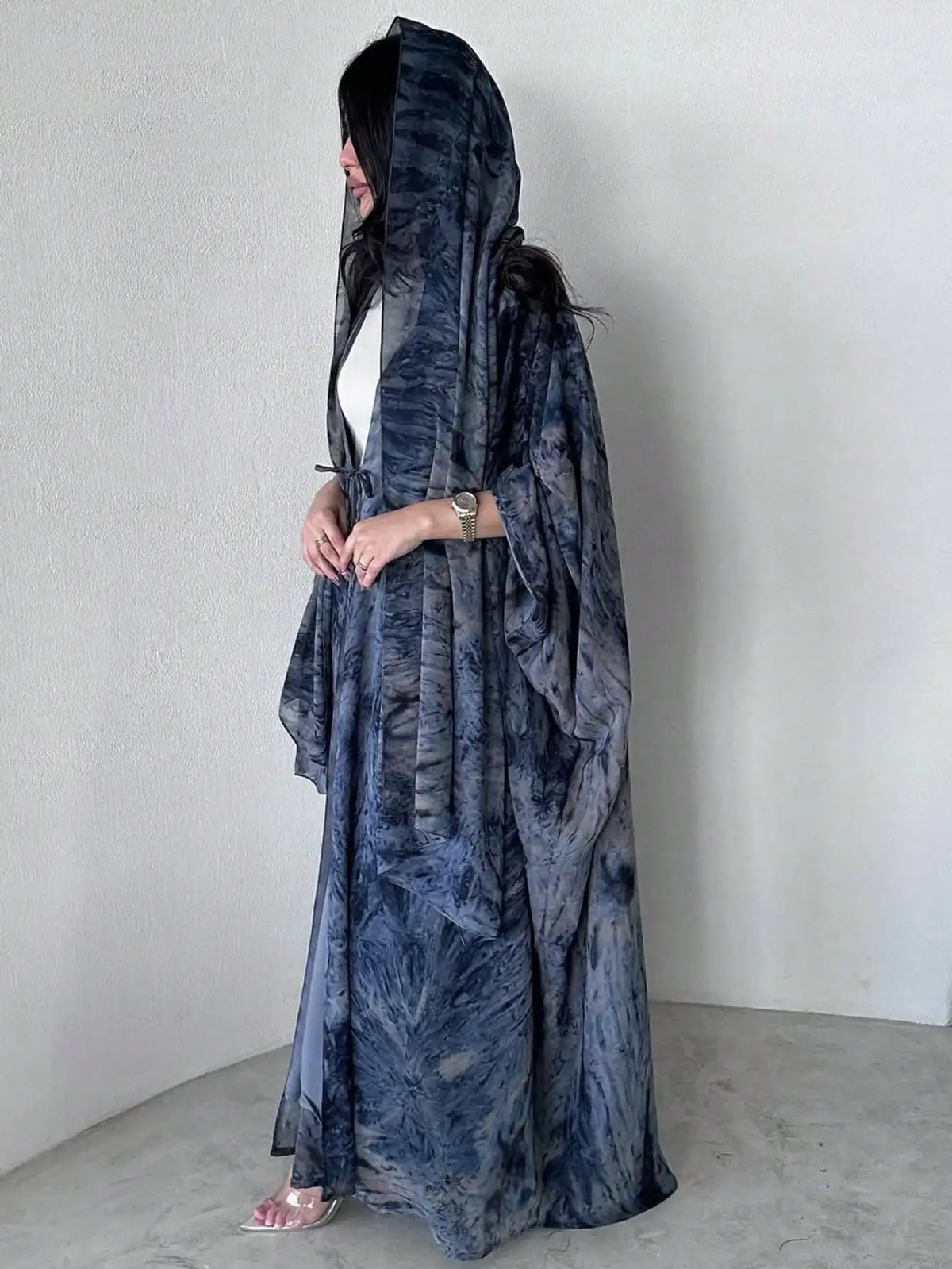 Full-length view of the blue printed open abaya