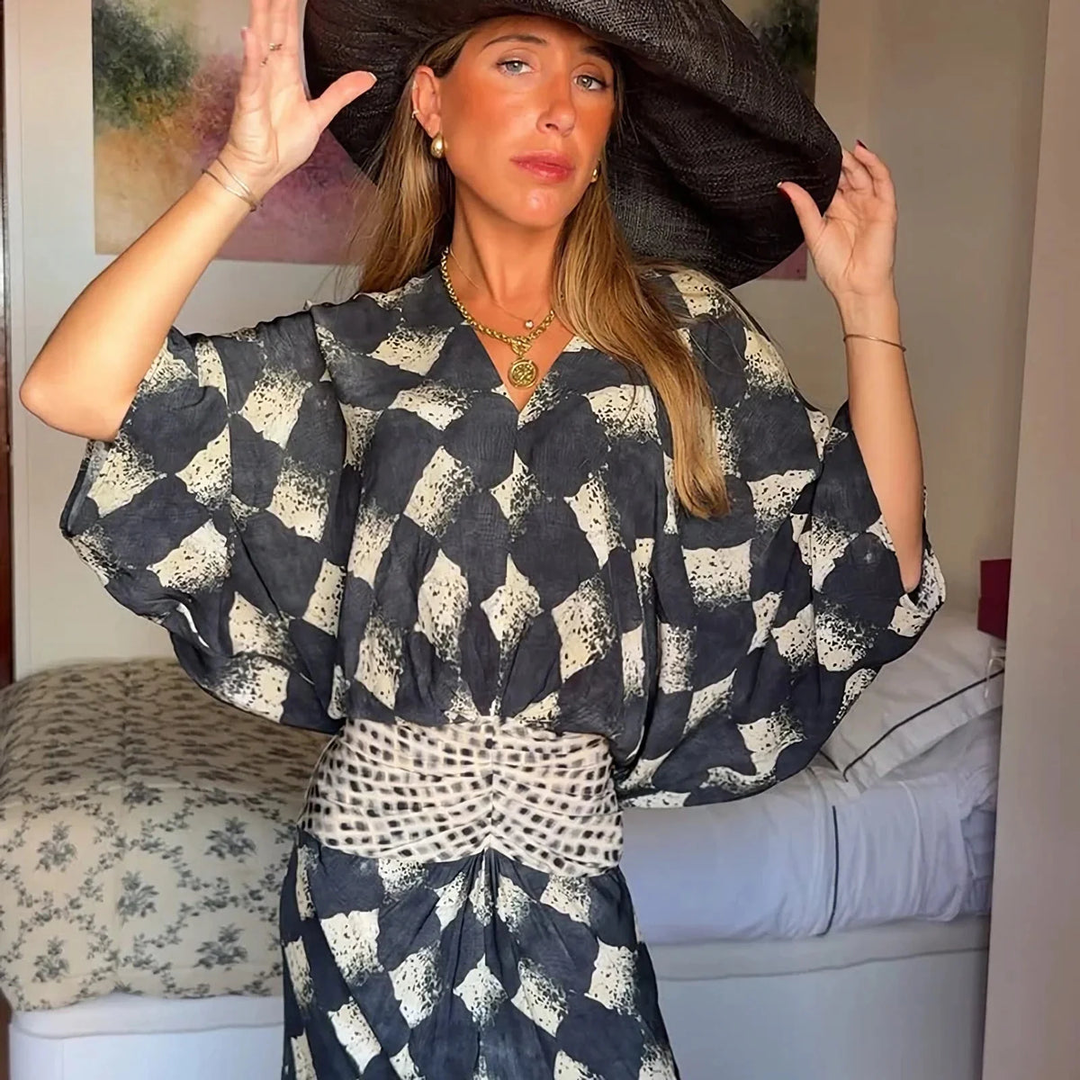 HIA diamond print twist-front dress — waist and sleeve detail