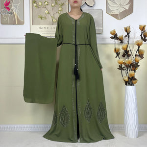 Olive Leaf abaya with teardrop motifs at the hem