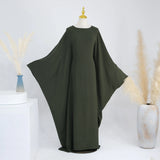 Army green batwing abaya displayed on a mannequin