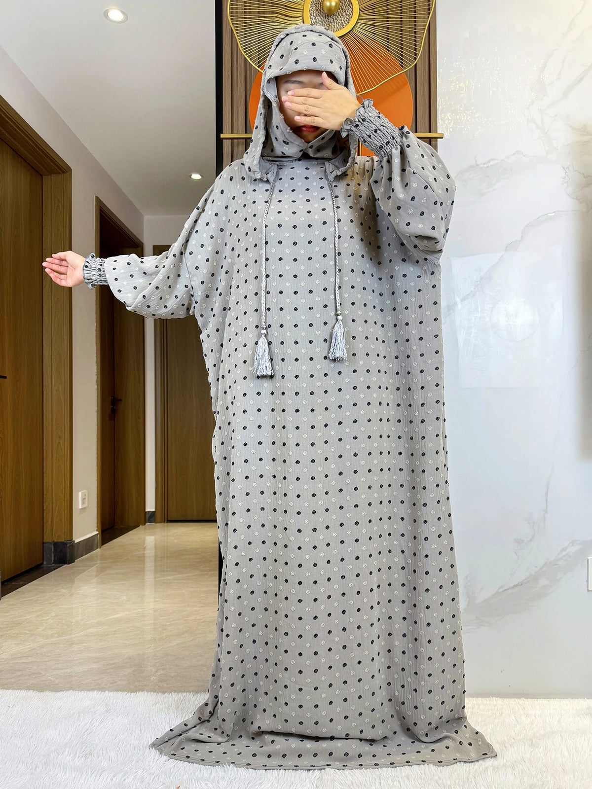 Gray fine-dot hooded prayer dress, full-length front view