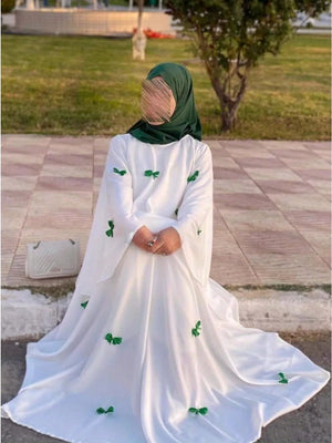 HIA Bow-Detail Flared-Sleeve Abaya — product styling and bow detail 5