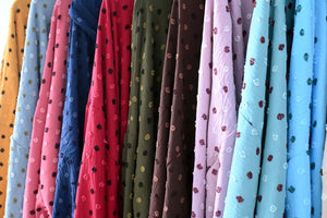 Textured dot fabric colour range