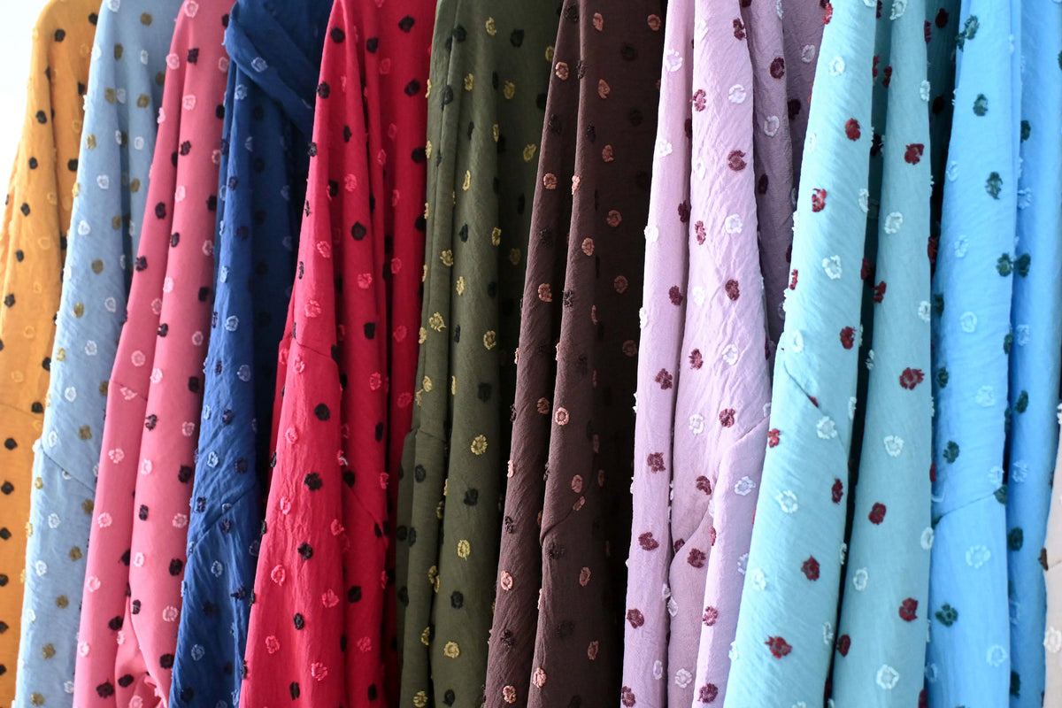 Textured dot fabric colour range
