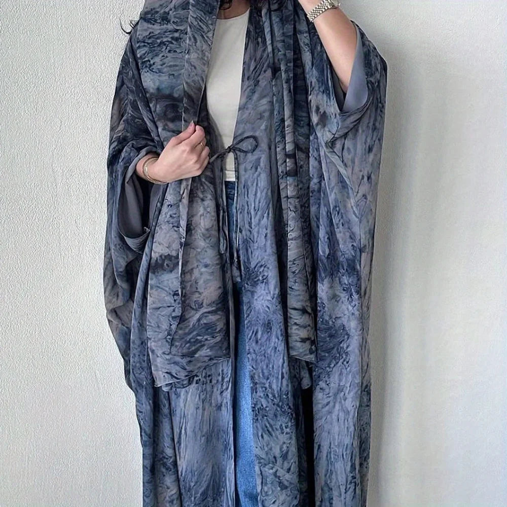 Blue tie-dye print open abaya, close-up of the front