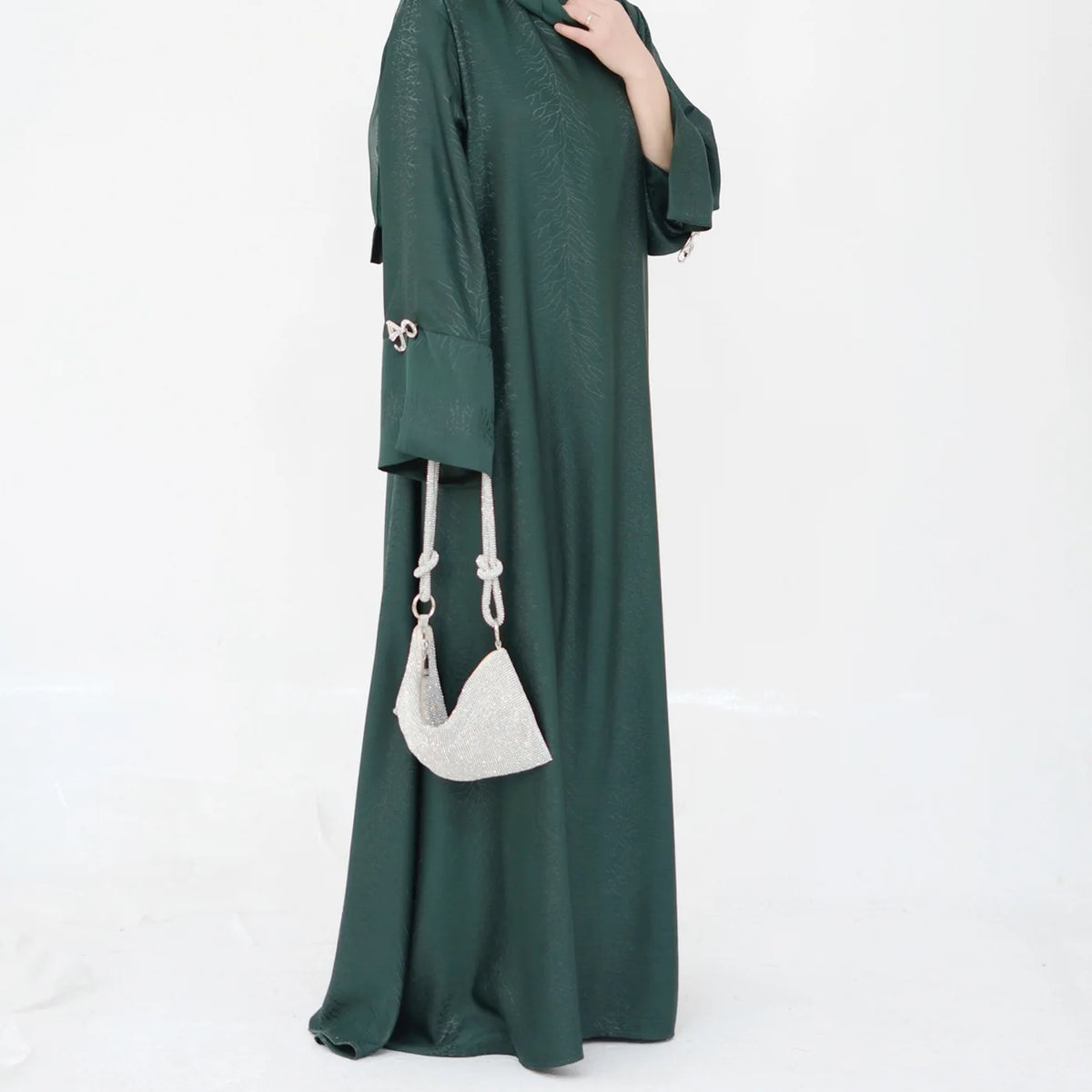 HIA Bow-Cuff Satin Abaya — Deep Green side view
