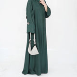 HIA Bow-Cuff Satin Abaya — Deep Green side view