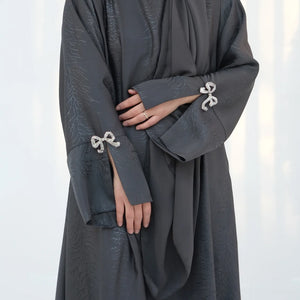 HIA Bow-Cuff Satin Abaya — Black full-length