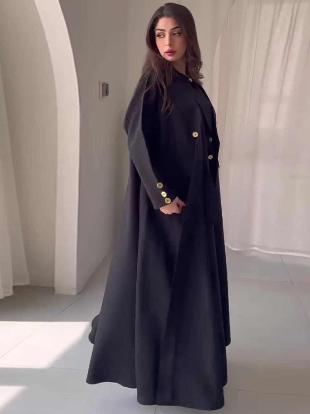 Side view of HIA black collared abaya