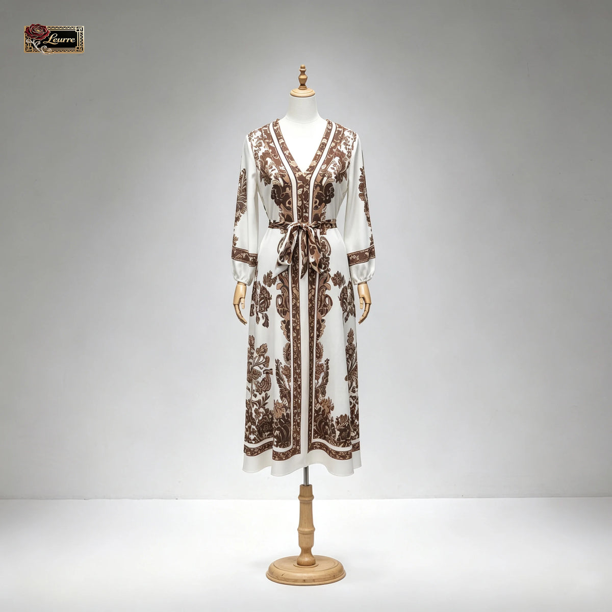 HIA ivory and brown floral belted dress — mannequin back view