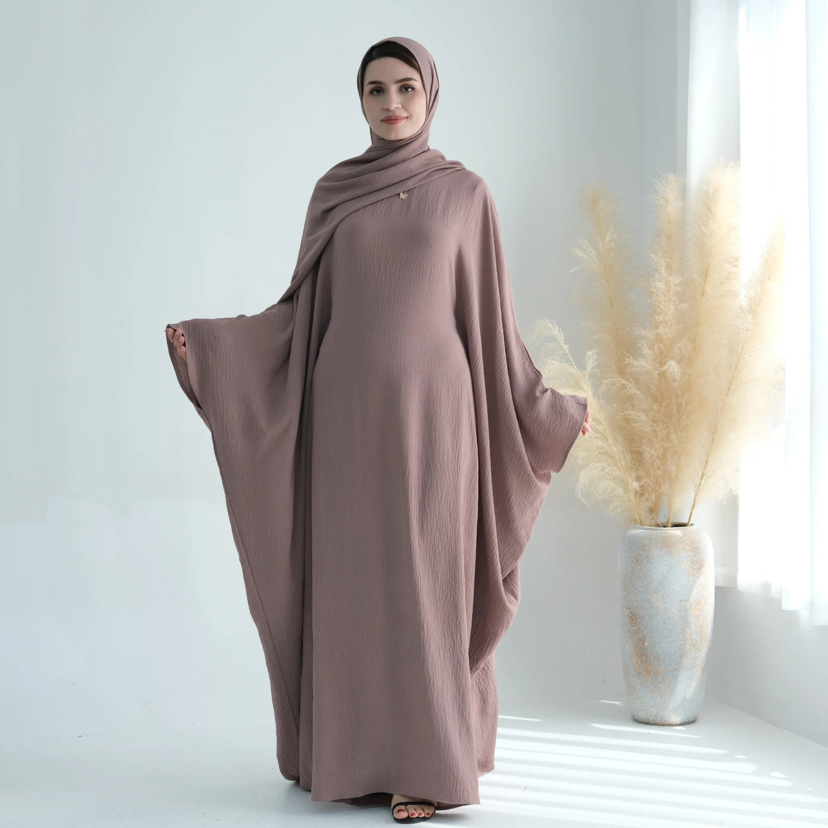 Mauve taupe abaya styled with a scarf