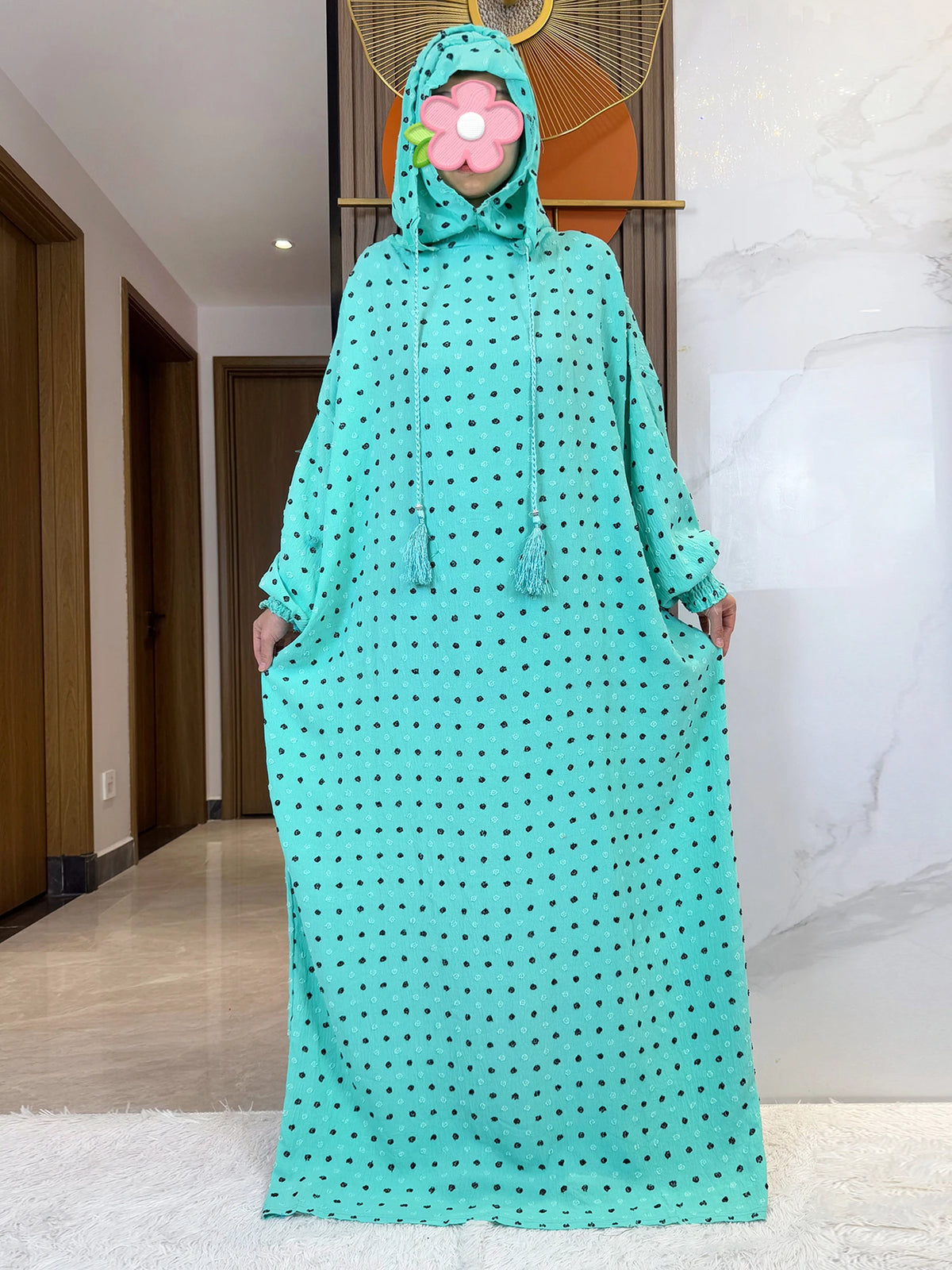 Turquoise fine-dot hooded prayer dress, full-length front view