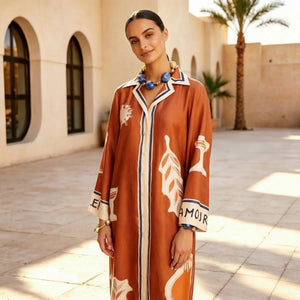 Terracotta shirt dress showing collar and print