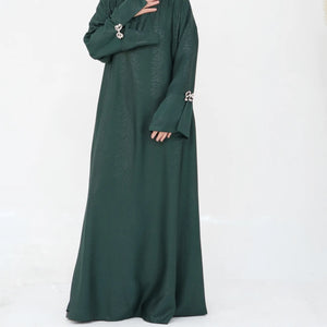 HIA Bow-Cuff Satin Abaya — Navy cuff detail
