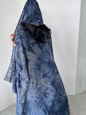 Blue printed abaya showing its loose silhouette from the back