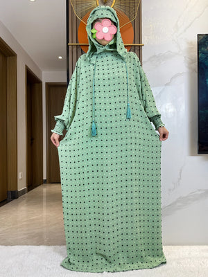 Mint fine-dot hooded prayer dress, full-length front view