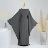 Dark gray batwing abaya displayed on a mannequin