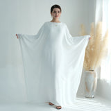 White batwing abaya showing extended sleeves