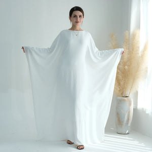 White batwing abaya showing extended sleeves