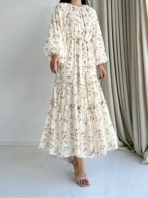 Back view of the cream floral tiered long dress