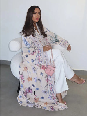 HIA Floral Border Open Abaya — Ivory Floral, seated styling view