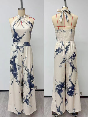 Ink Print Halter Wide-Leg Jumpsuit — actual garment front and open back on mannequin