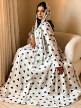 Heart Print Abaya & Hijab Set — White with Black Hearts seated view