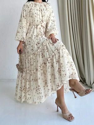 Cream floral tiered long dress with long sleeves and tie waist, front view