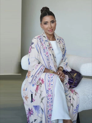 HIA Floral Border Open Abaya — Ivory Floral, seated front view