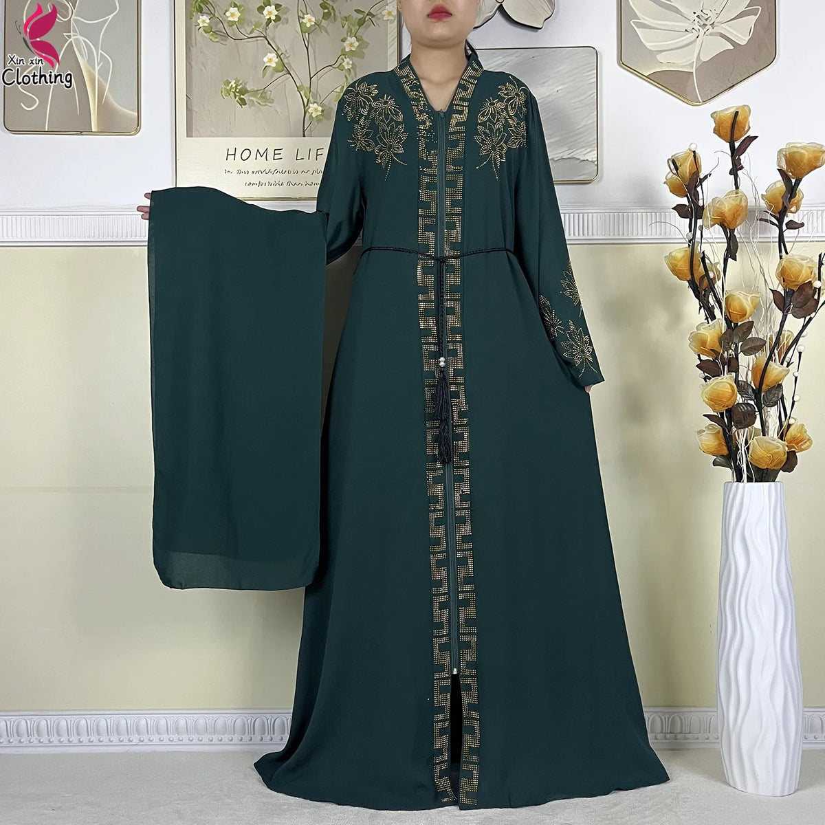 Forest green Ornate abaya with belt and matching fabric shown