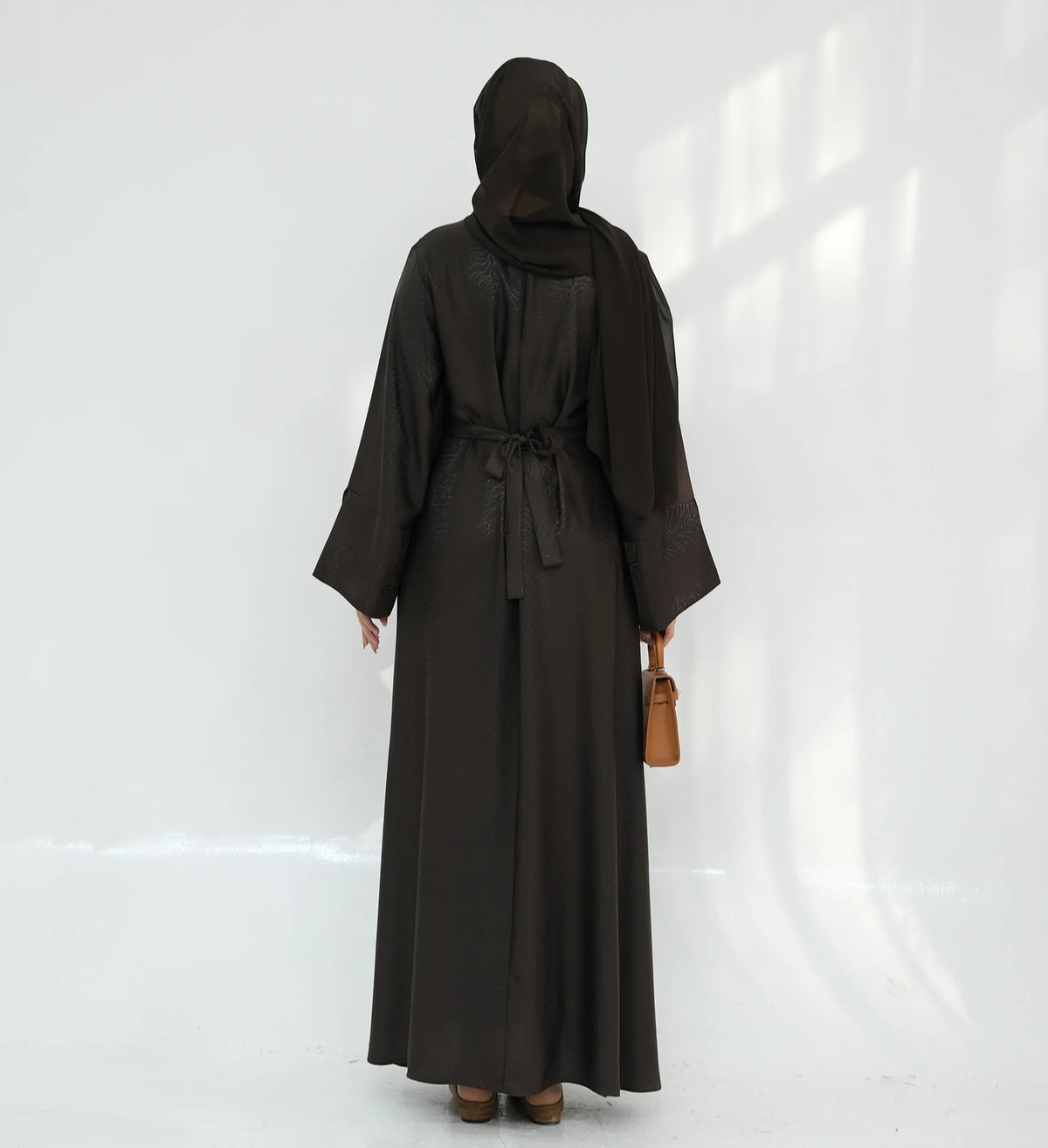 HIA Bow-Cuff Satin Abaya — Coffee back view