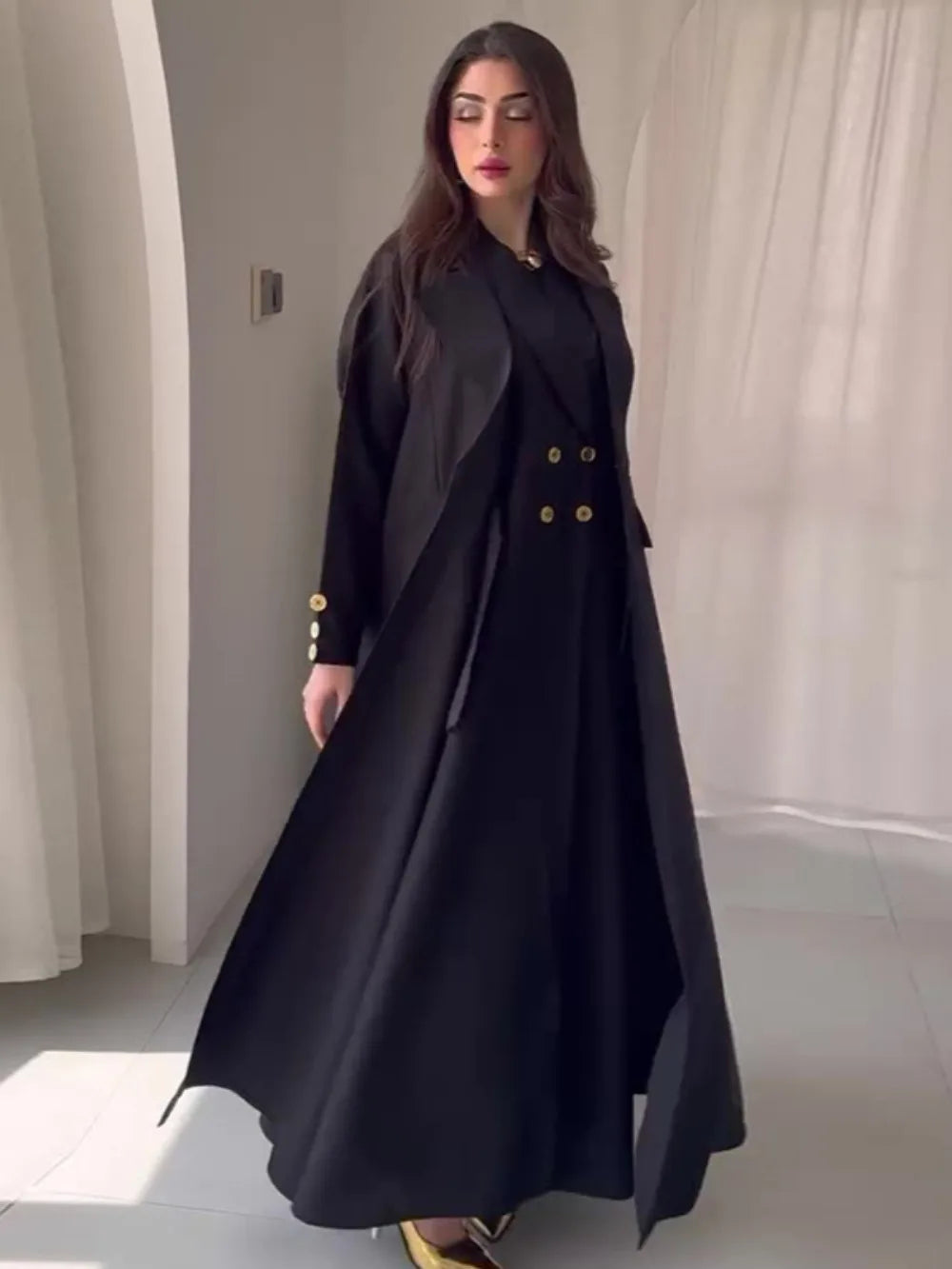 HIA Collared Button-Detail Abaya in black, full-length model view