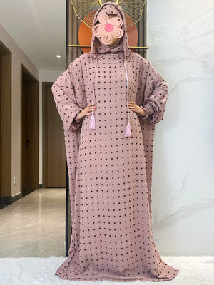 Mauve Textured Dot Hooded Prayer Dress showing the loose silhouette