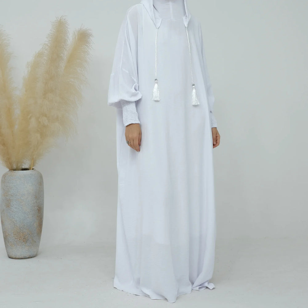 White tassel-tie hooded abaya, full-length front view
