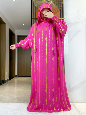 HIA Gold-Accent Hooded Prayer Dress in Fuchsia, raised-sleeve view